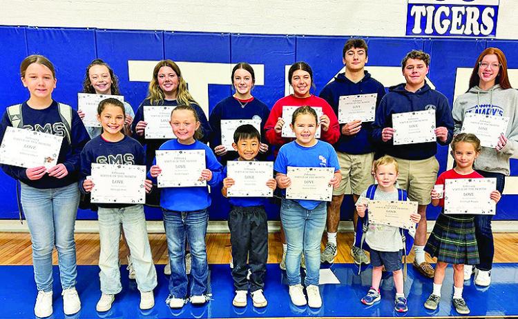 Congratulations to St Mary’s February Virtue of the Month recipients. Pictured on front row from left are Addison Albert, Milleigh Aton, Emily Harper, Daniel Han, Aurora Alford, Beau Connor and Everleigh Raggio. On back row are Paisley Rae Tilley, Ady Rhodes, Lilly Boyd, Grace Wren, John Paul Thibodaux, Gunner Nash and Brianna McConathy. Not pictured is Carson Arredondo.