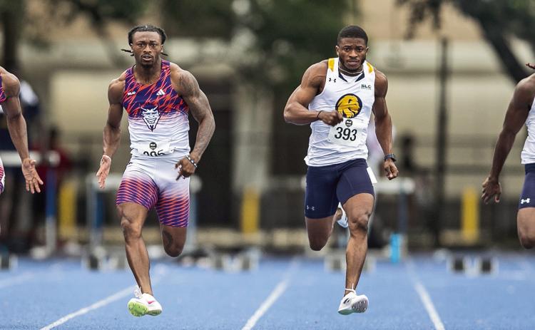 Zachaeus Beard (second from left) earned a spot at nationals in both the 100-meter dash and as a member of the 4x100 relay, along with Keontae Gaines (far left). Photo by Prentice James