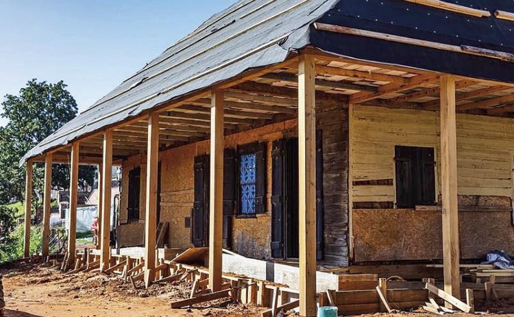 Work is underway on the exterior of the Roque House