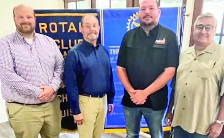 Rotarian with the Program Josh Manuel introduced the CEO of Pelican Broadband Mike George and the Director of Marketing Stewart Carnline at the July 16 Rotary luncheon. George discussed fiber optic technology and the services provided by Pelican. Pictured from left are Manuel, George, Carnline, and Rotary Past-President Joe Sers.